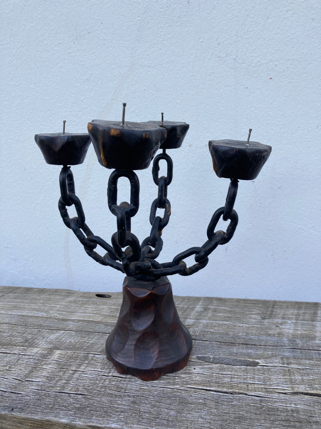 Brutalist iron and wood chain candle holder from the 1970s