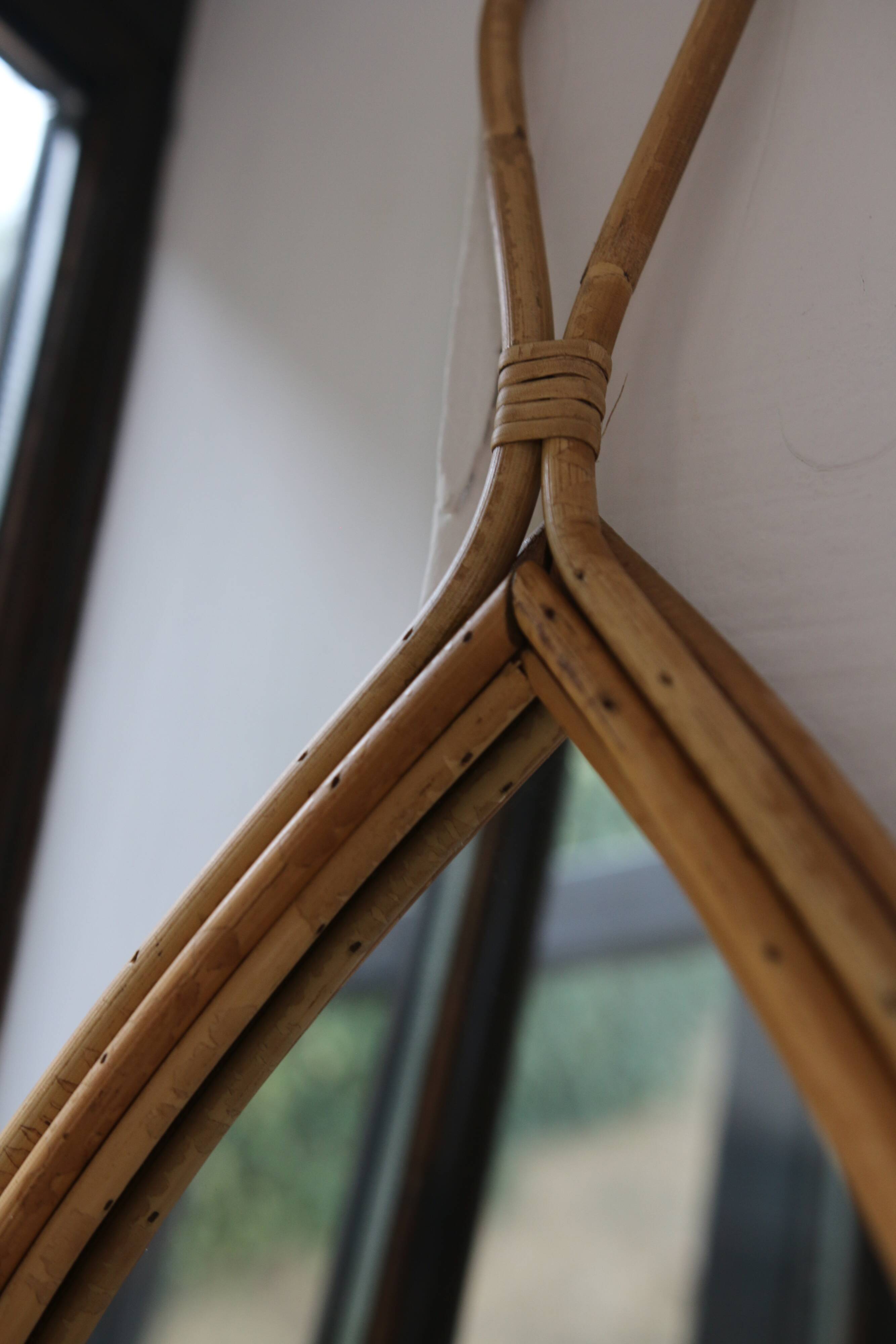 Vintage teardrop rattan mirror
