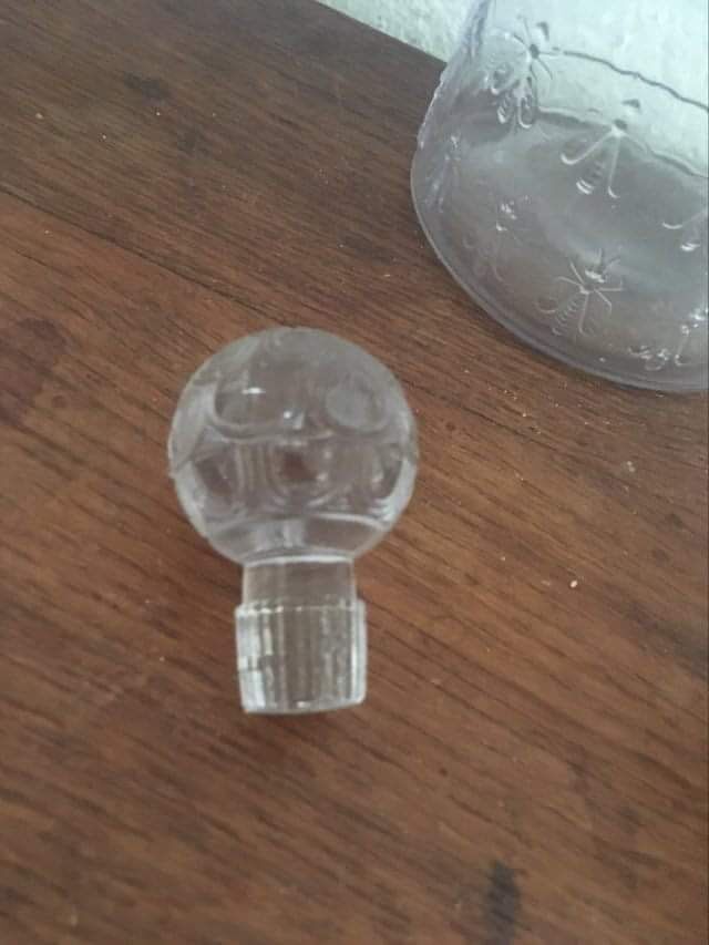 Guerlain bottle with bees.