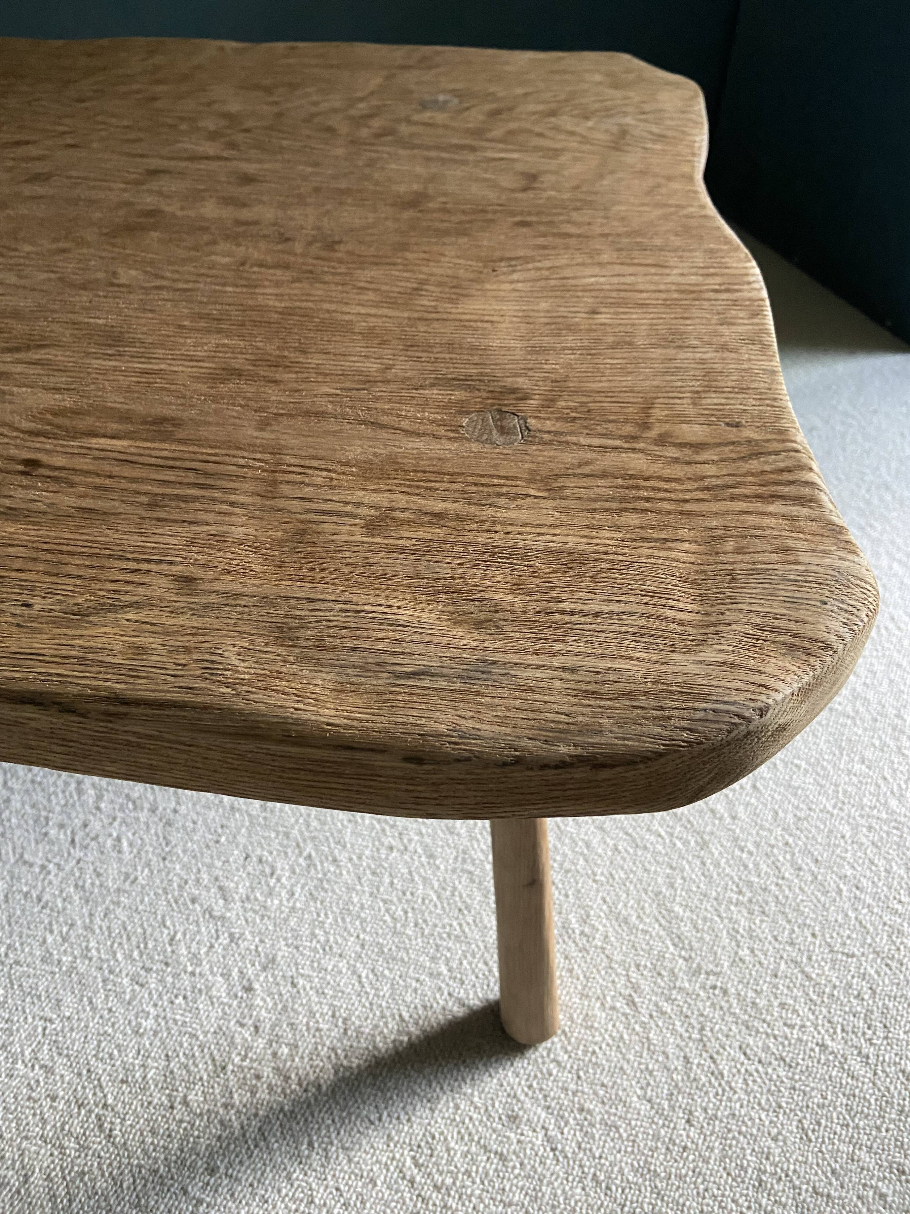 Free-form raw wood coffee table