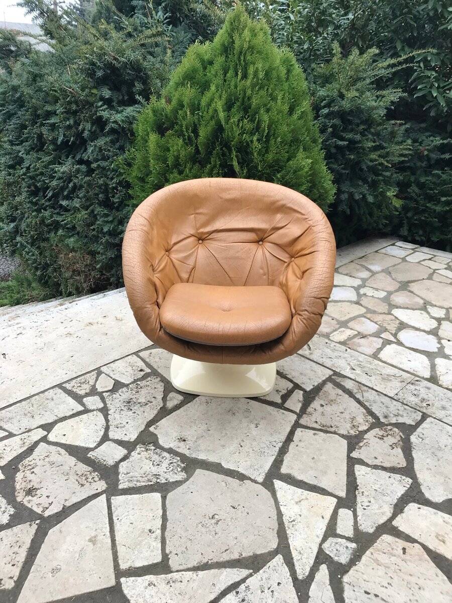 Brown tulip club chair in fibreglass resin and faux leather, France 1970s by Raphaël