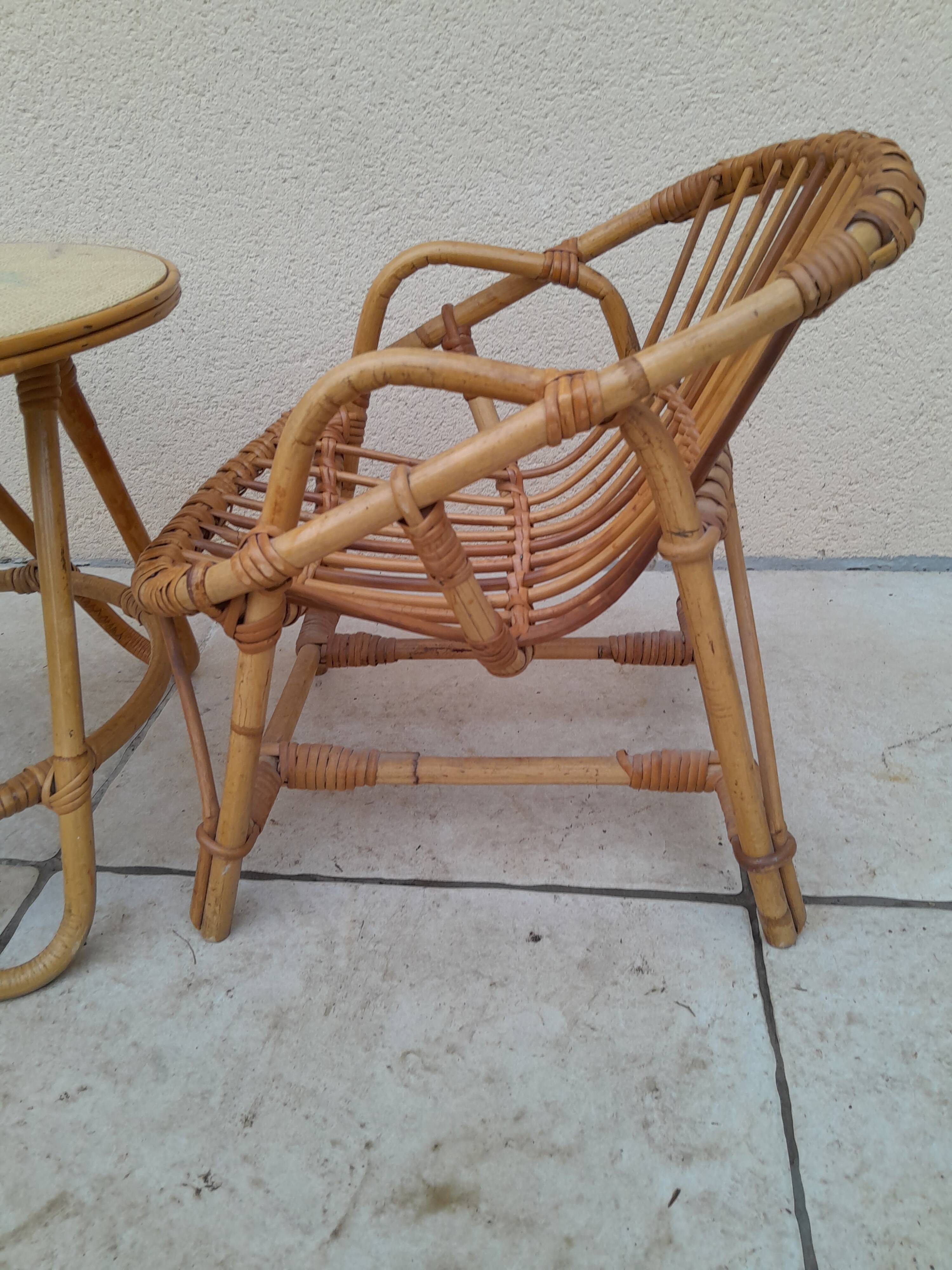 Vintage rattan children's table and armchair