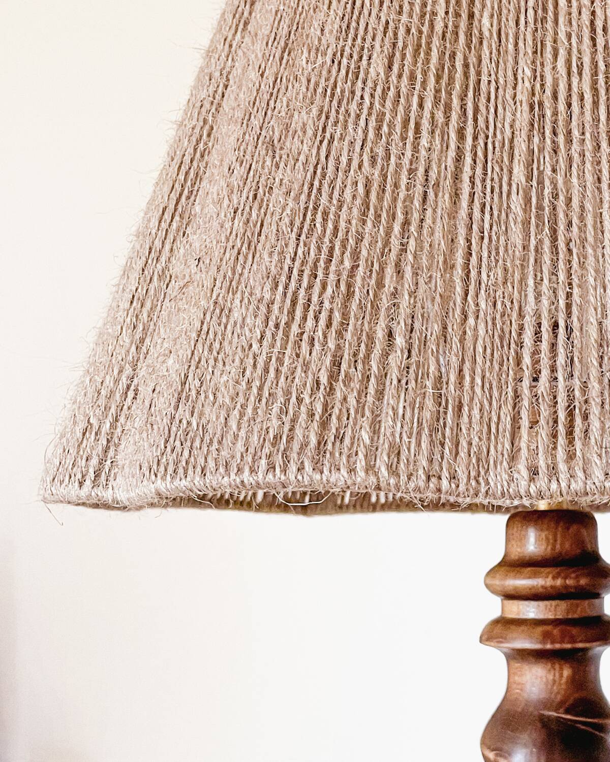 Turned wood lamp and jute lampshade