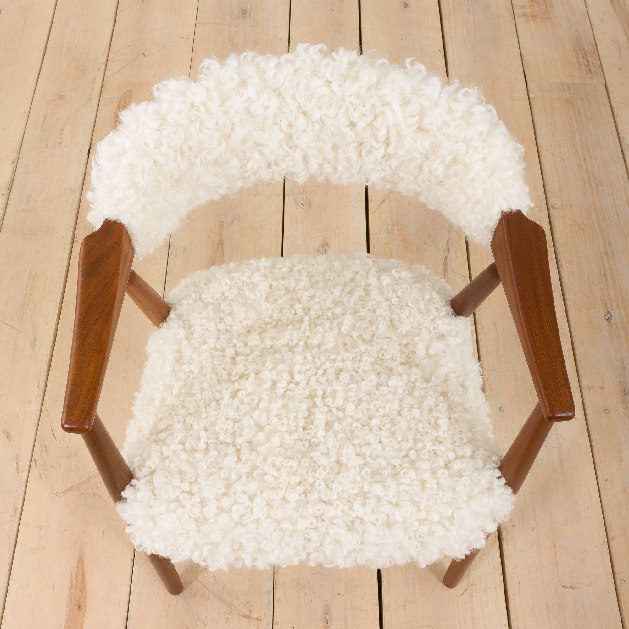 Th. Herlev, Farstrup solid teak chair in natural sheepskin upholstery, Denm