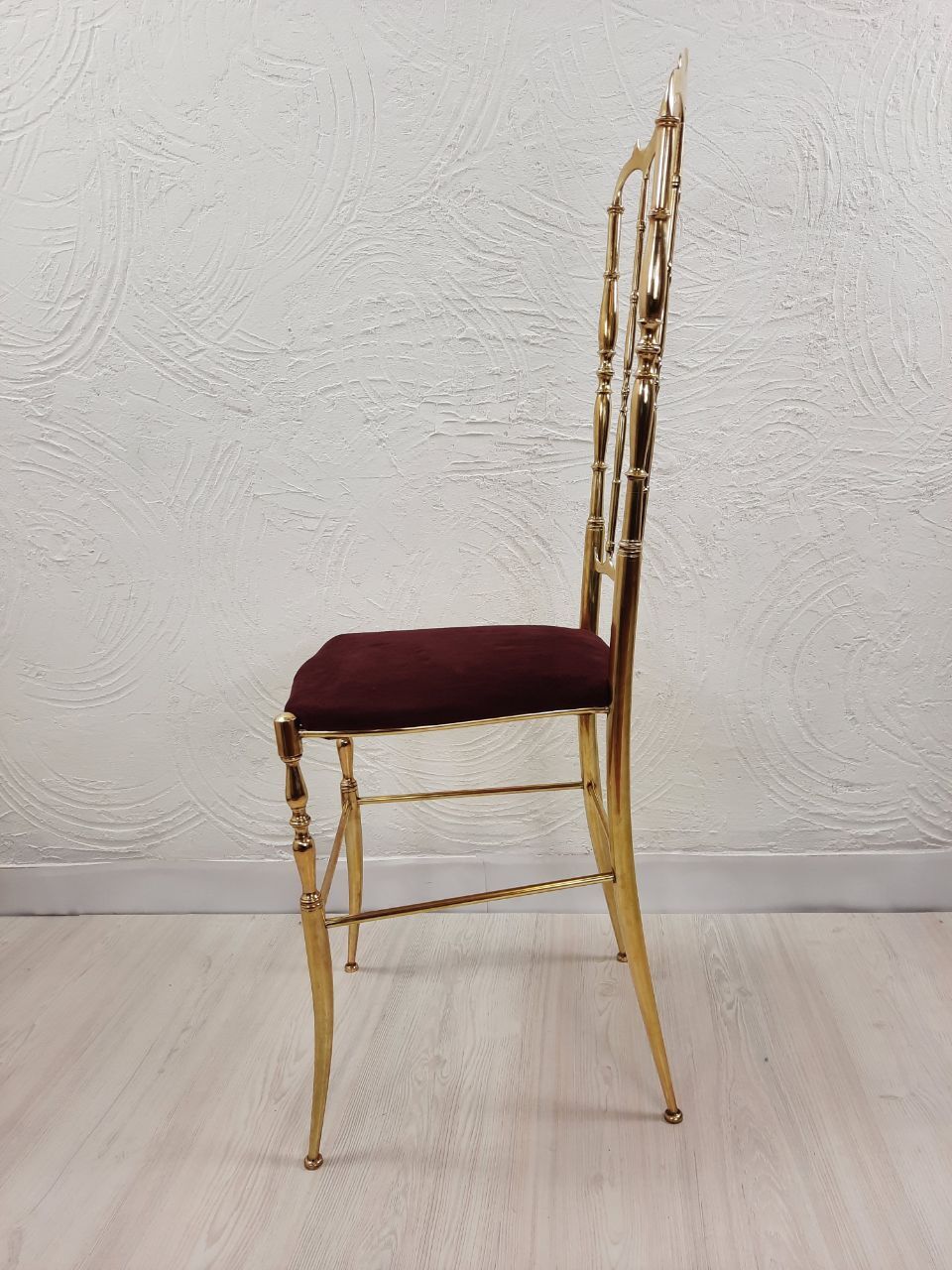 Pair of chiavarine chairs, brass