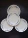 4 vintage white and blue earthenware dinner plates - Floral design