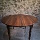 Antique drop-leaf dining table in walnut, France, circa 1900.