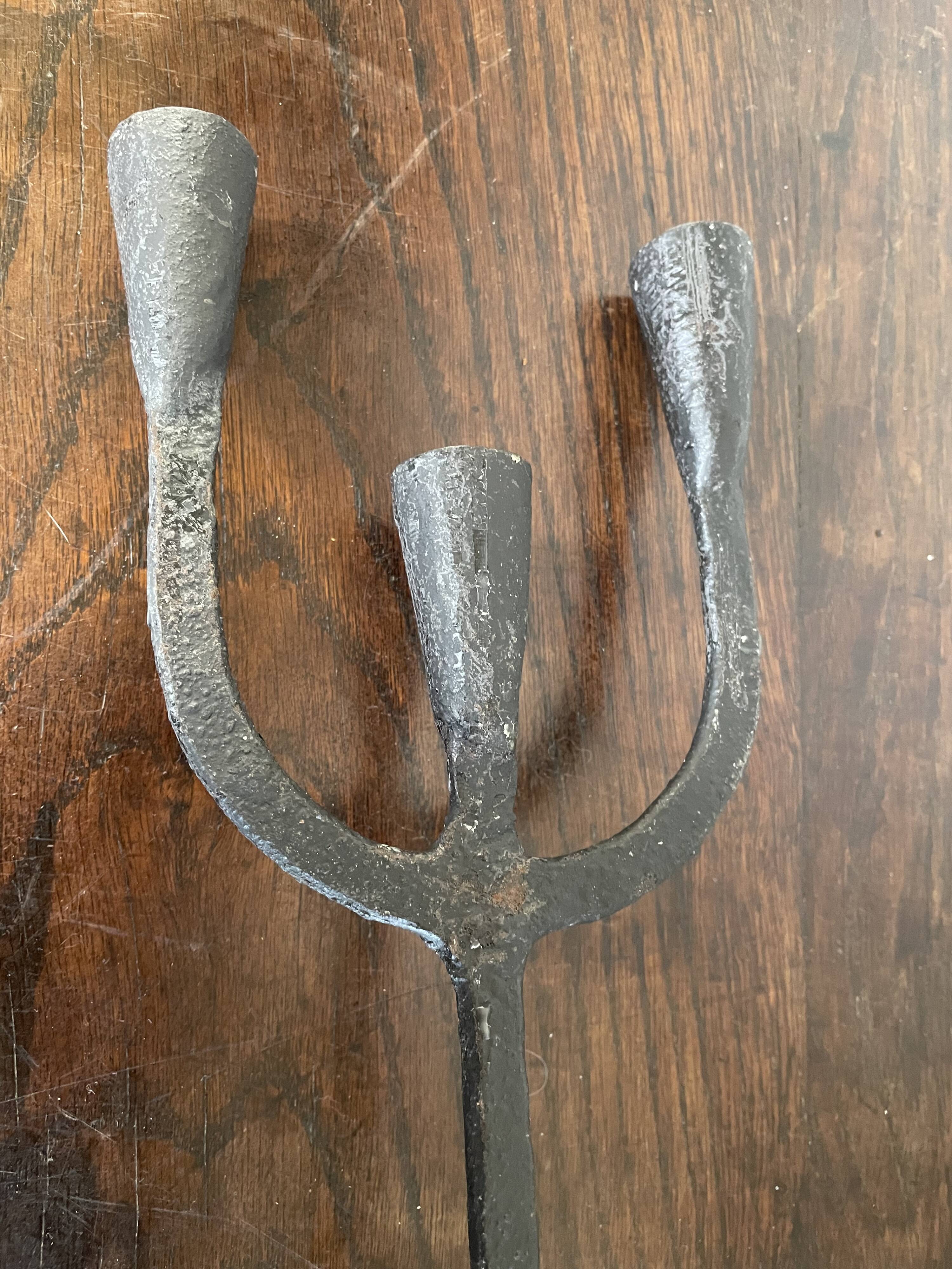 Wrought iron candlesticks