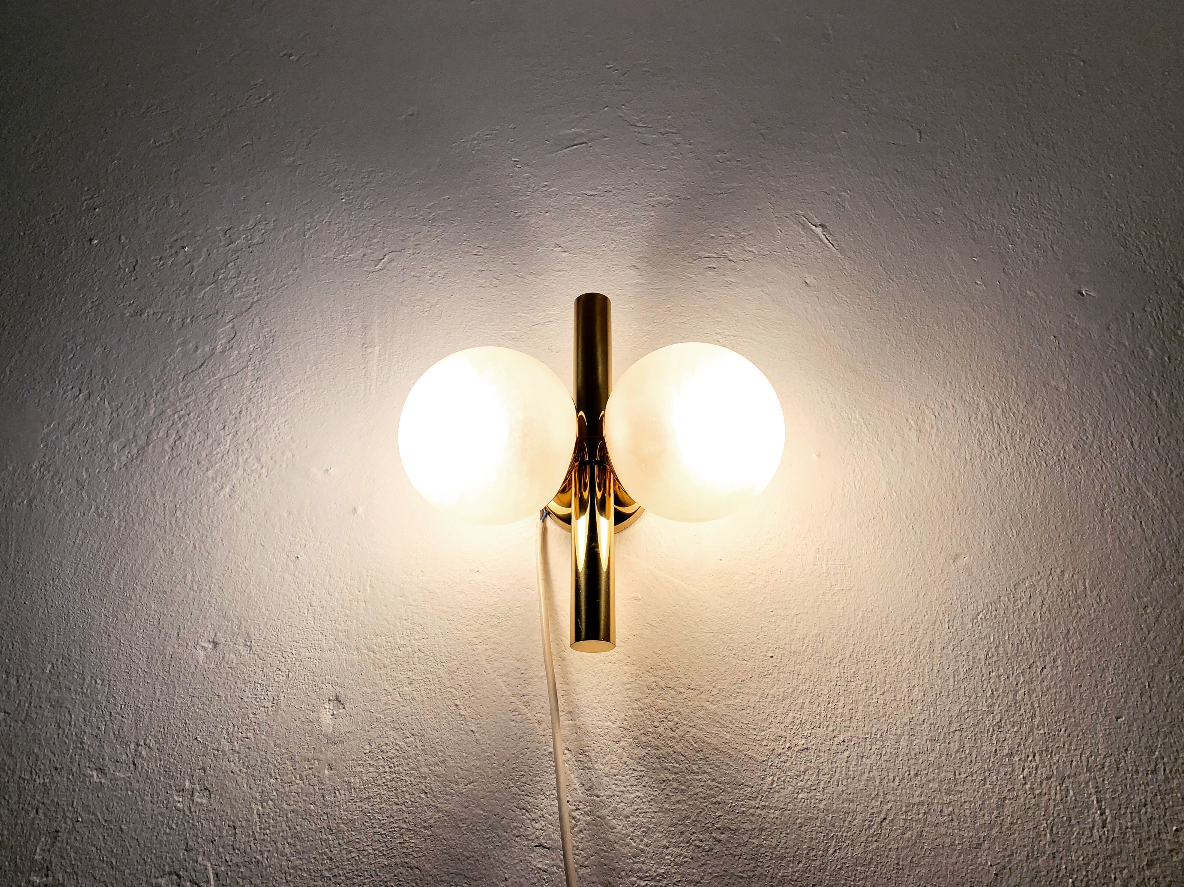 Golden Sputnik sconce by Kaiser Leuchten
