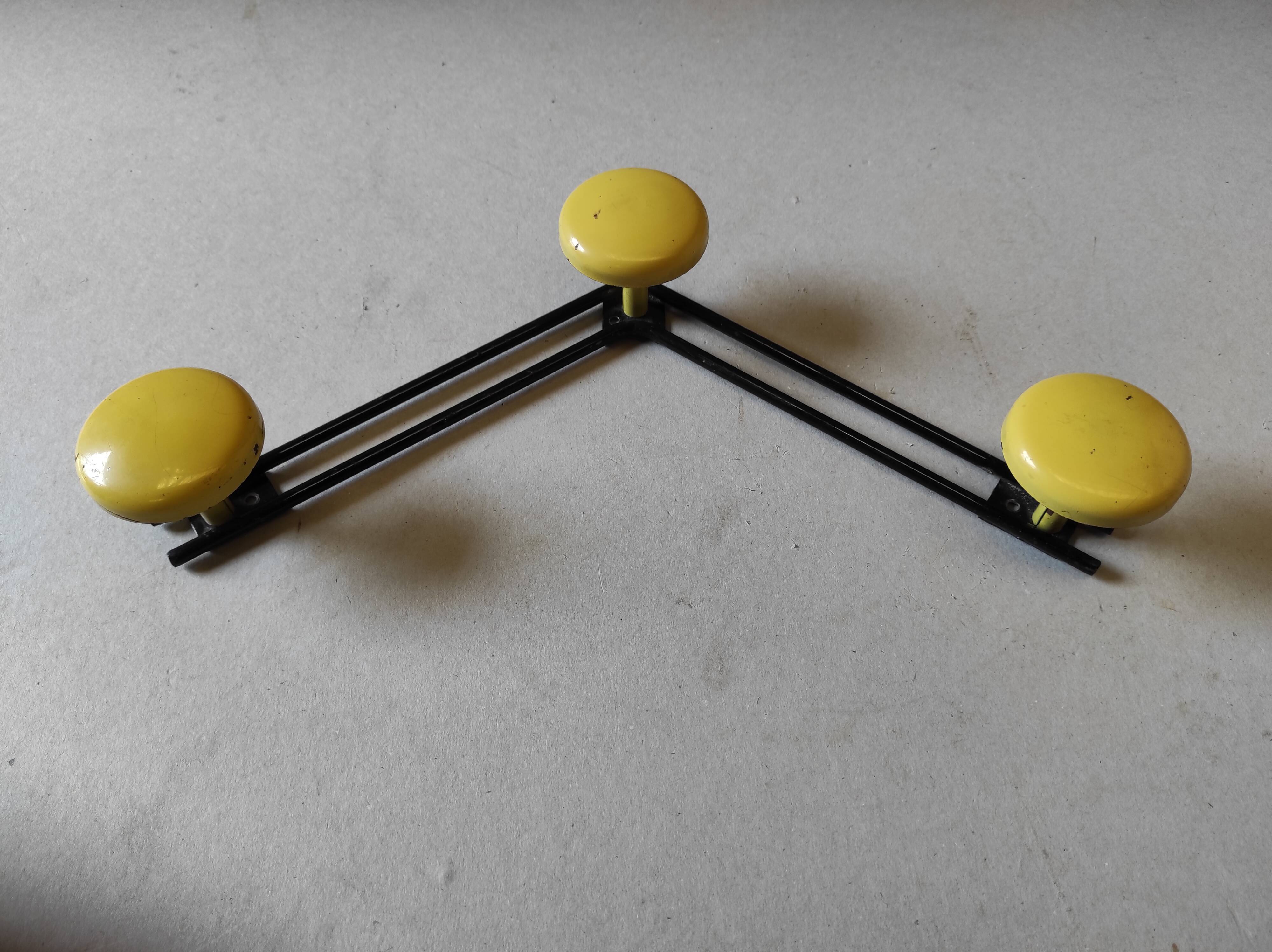 Vintage wall mount in black and yellow metal