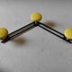 Vintage wall mount in black and yellow metal