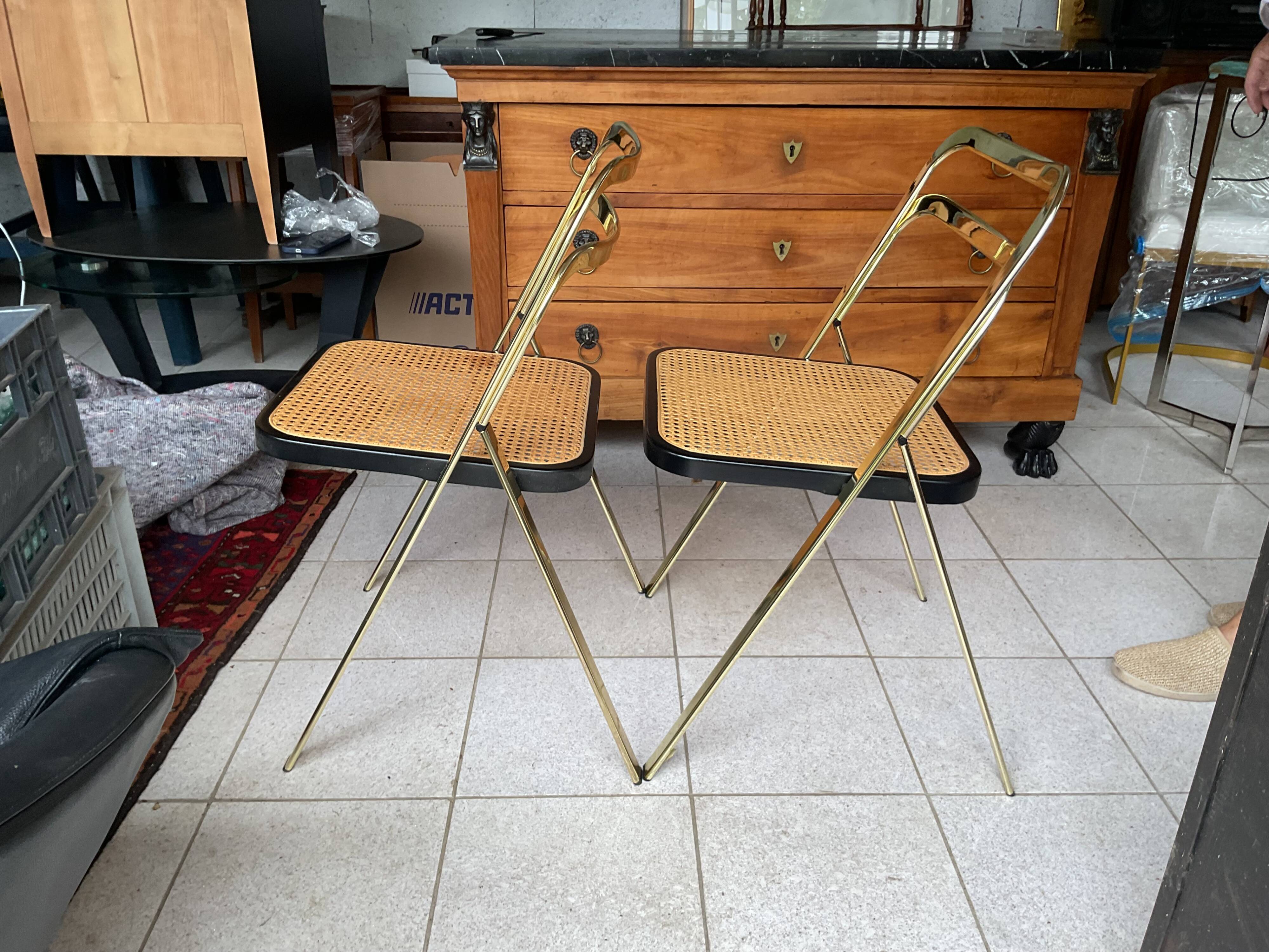 2 ribbed folding chairs CIDUE in gold chrome