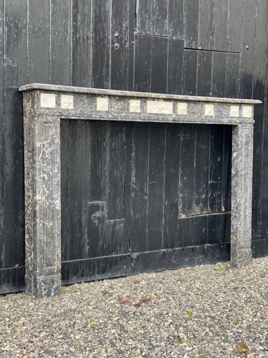 Louis XVI style fireplace in grey Saint Anne and white Carrara marble