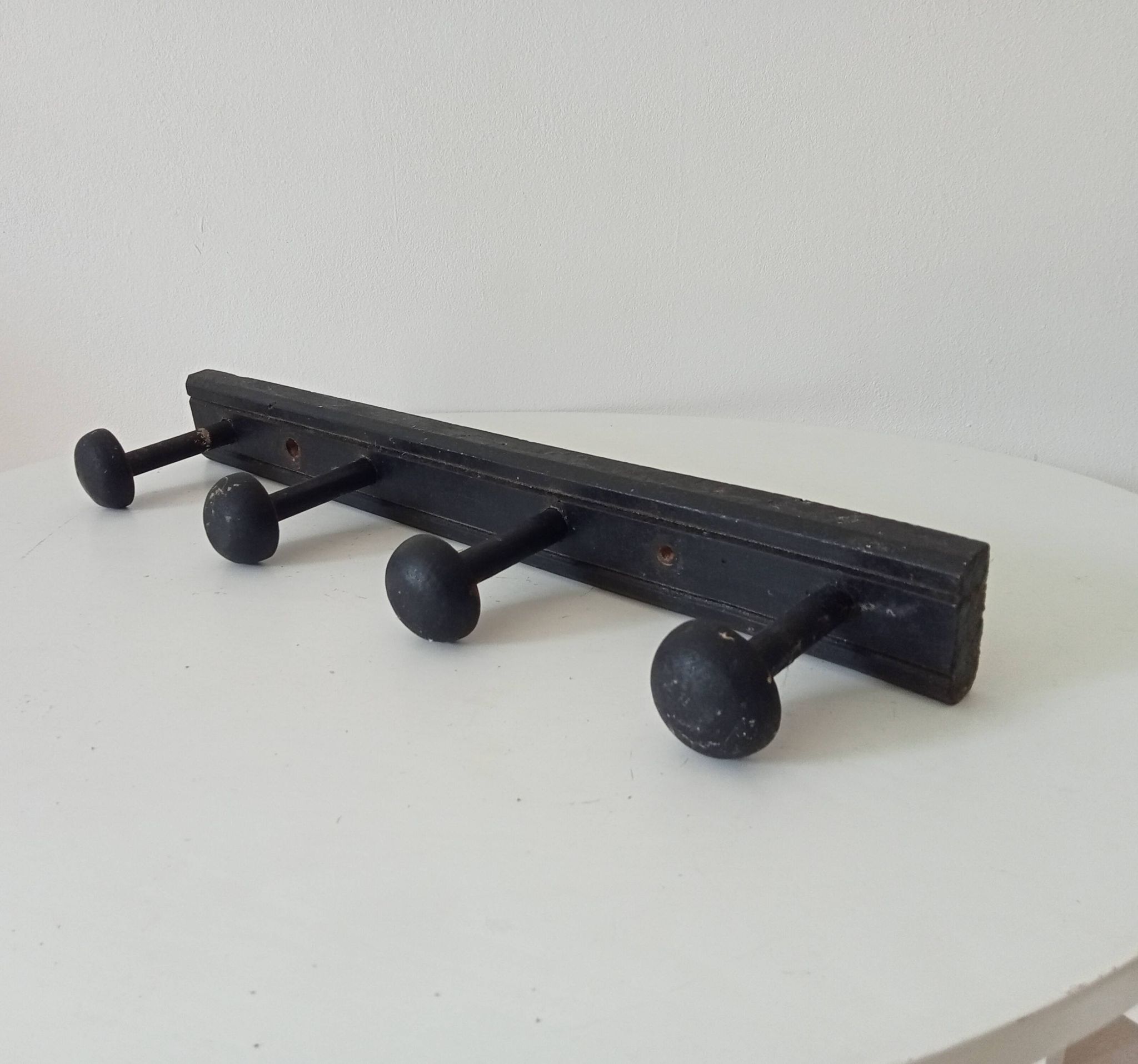 Old wooden wall coat rack