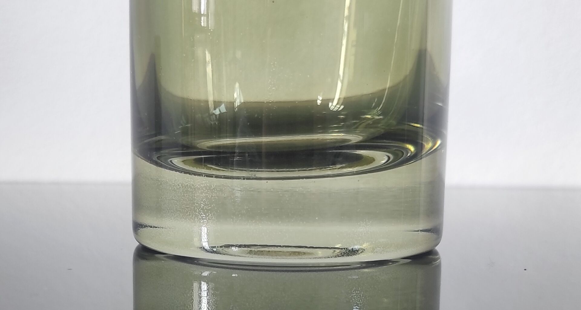 Sculptural vase in olive green glass