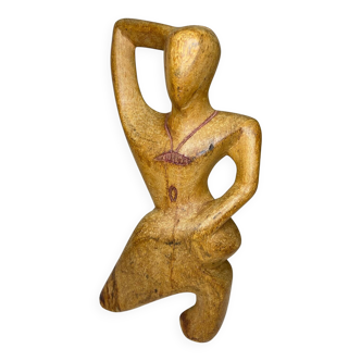 Wooden woman sculpture