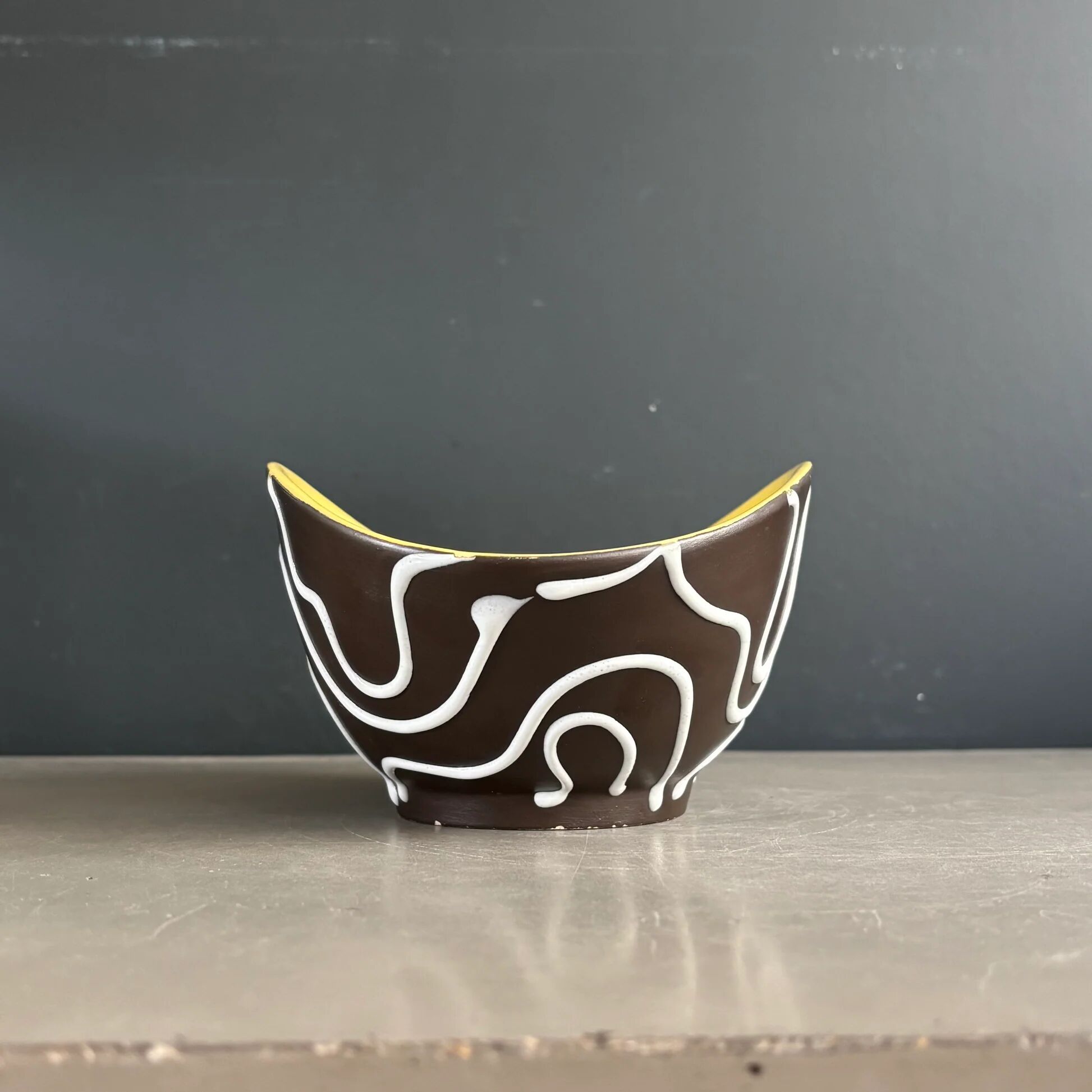 Yellow and black ceramic aperitif bowl, free form, West Germany.