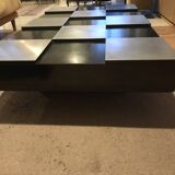 Coffee table with stainless steel checkered top and black formica