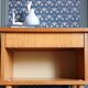 Nightstand in golden oak veneer. Around 1970.