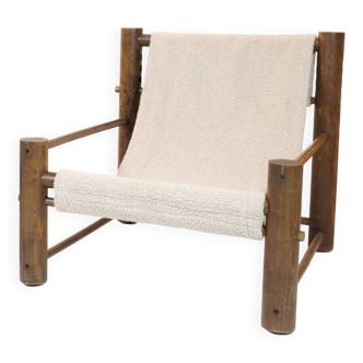 Solid wood armchair with adjustable backrest.