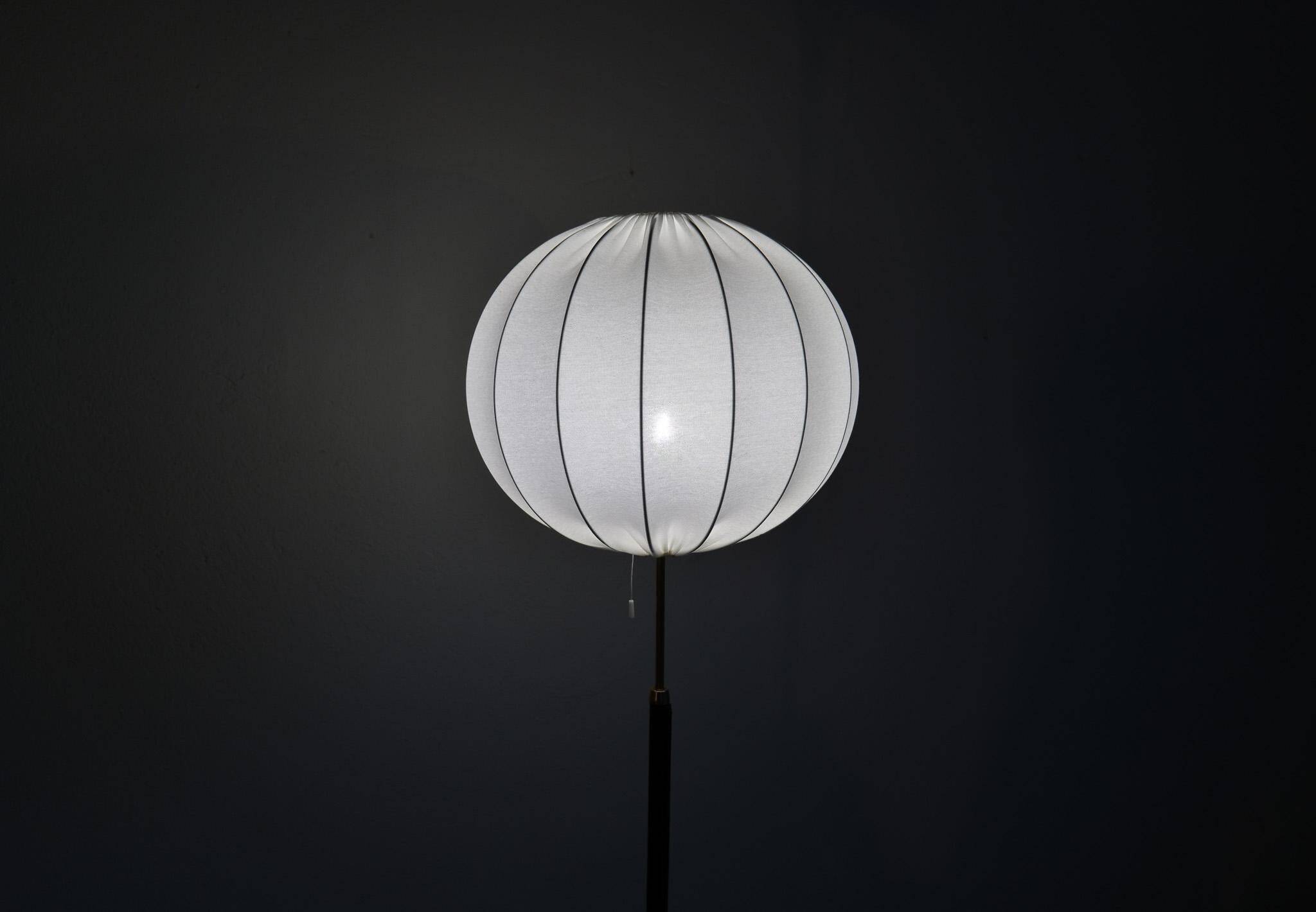 Mid-century black leather and brass floor lamp by Falkenbergs Belysning, Sweden, 1960s.