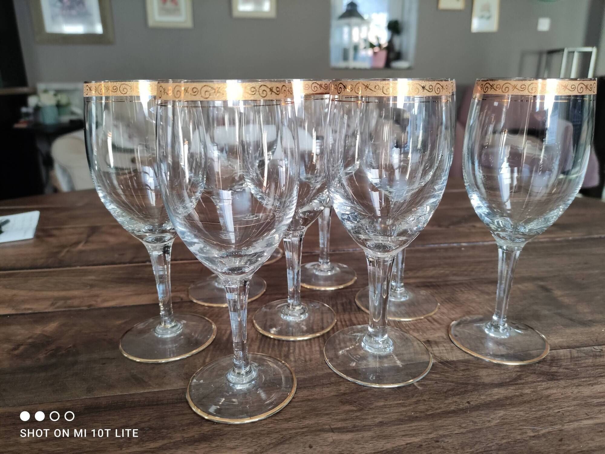 Set of 9 water or red wine glasses in crystal curled and gilded edging