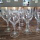 Set of 9 water or red wine glasses in crystal curled and gilded edging