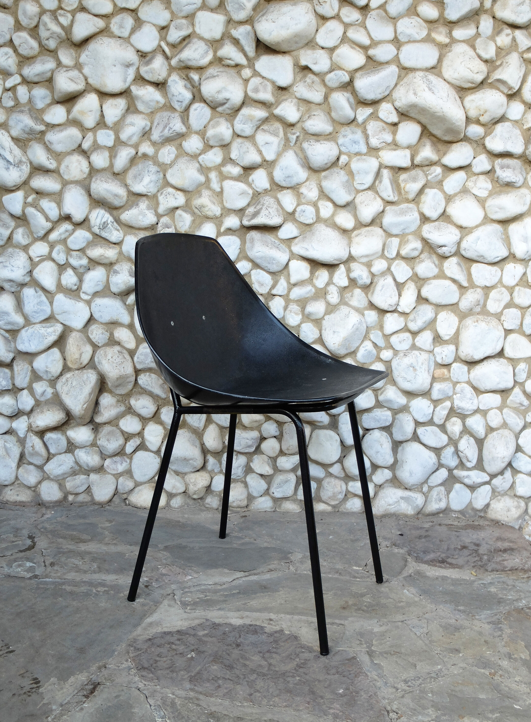 Black shell chair Pierre Guariche for Meurop 1960s