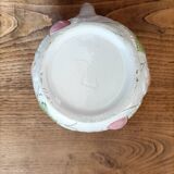 Barbotine pitcher with pastel flower decoration