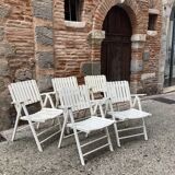 Five wooden garden armchairs