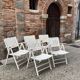 Five wooden garden armchairs