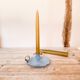 Blue enameled sheet metal candle holder