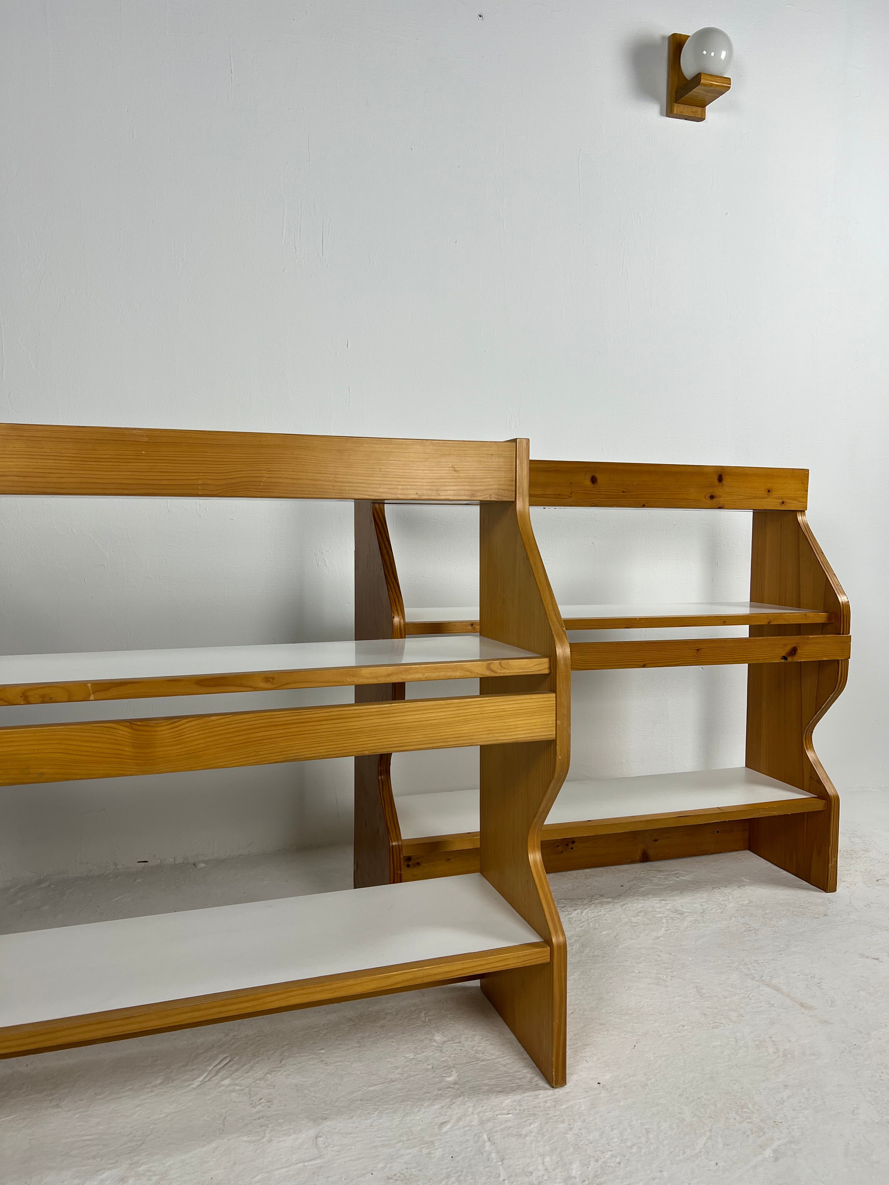 Duo of shelves by Charlotte Perriand