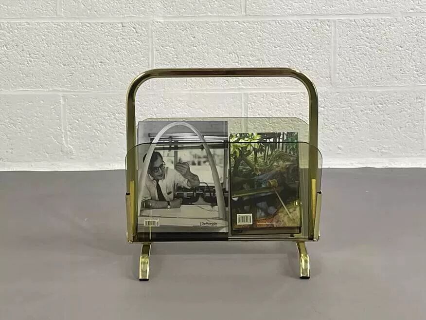 Vintage magazine rack in smoked glass and brass.