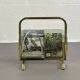 Vintage magazine rack in smoked glass and brass.