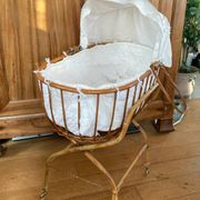 Bamboo, rattan, wicker cradle bassinet from the 1960s with a foldable support.