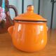 Sugar pot in orange enamelled sandstone