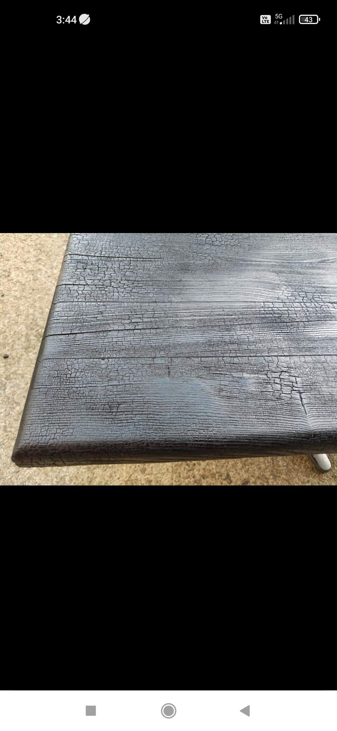 Table basse en chêne Shou Sugi Ban et piètement en étoile en aluminium