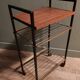 Serving table with metal wood wheels