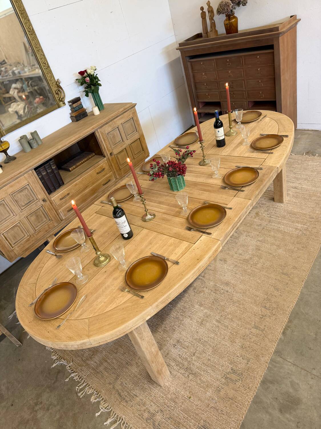 Oval farmhouse table in solid oak with extensions.