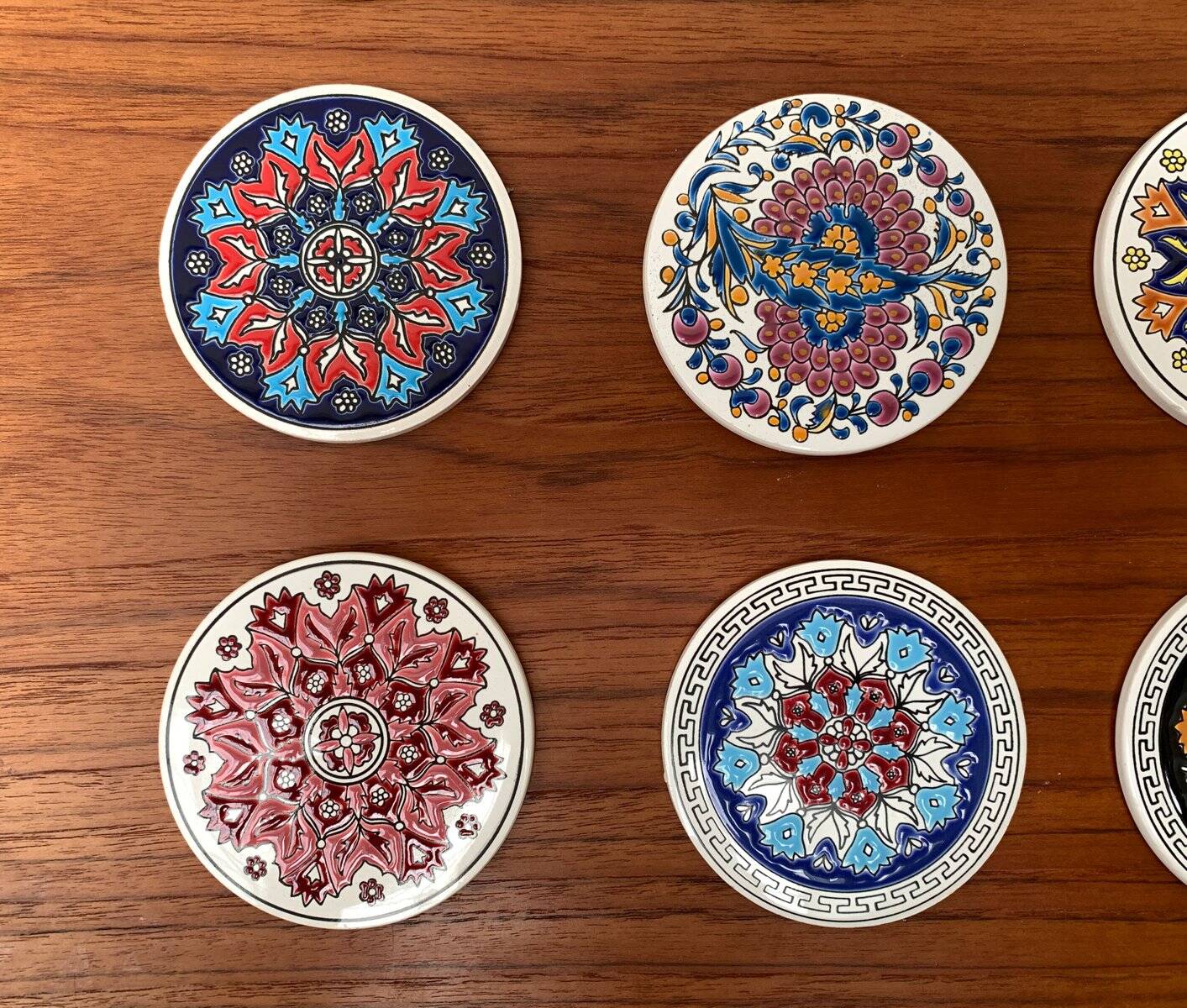 Set of 13 vintage ceramic coasters handmade by Lito Niarchos.