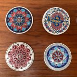 Set of 13 vintage ceramic coasters handmade by Lito Niarchos.