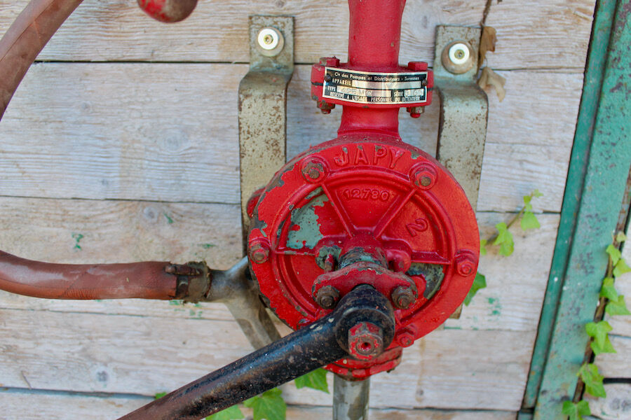 Pair of vintage petrol pumps from the japy brand, 1900