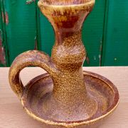 Candle holder in old earthenware signed by the 2 glued aa of the Accolay factory