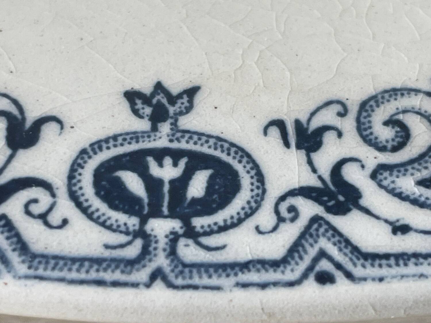 Old opaque porcelain dish from Gien, Montmorency model