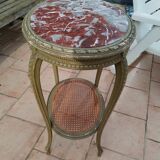 Old oval table with marble top, Louis XVI style