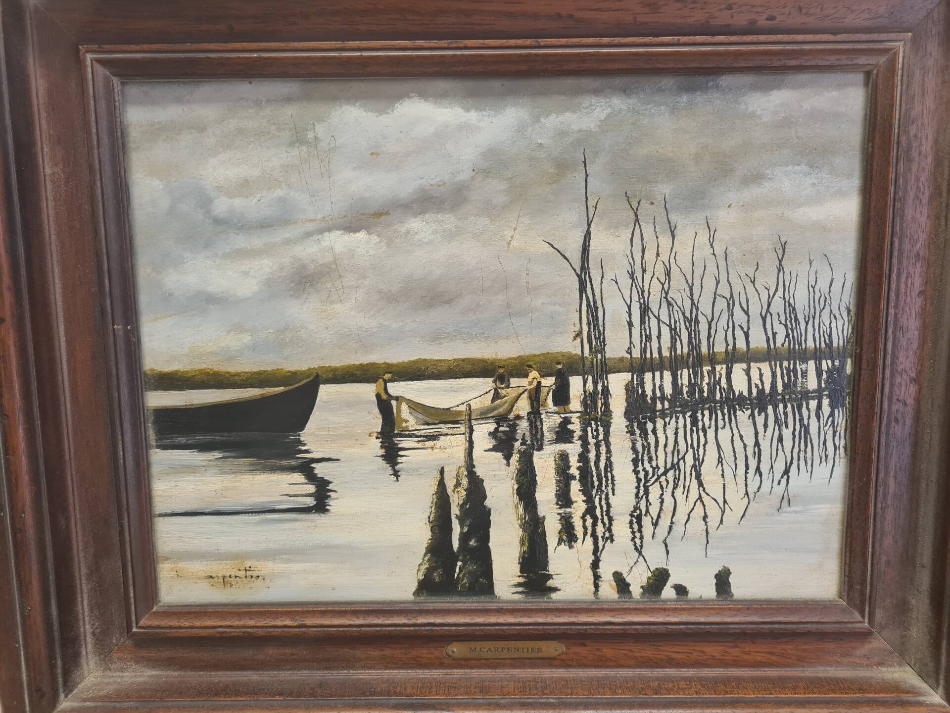 Landscape painting with a wooden frame