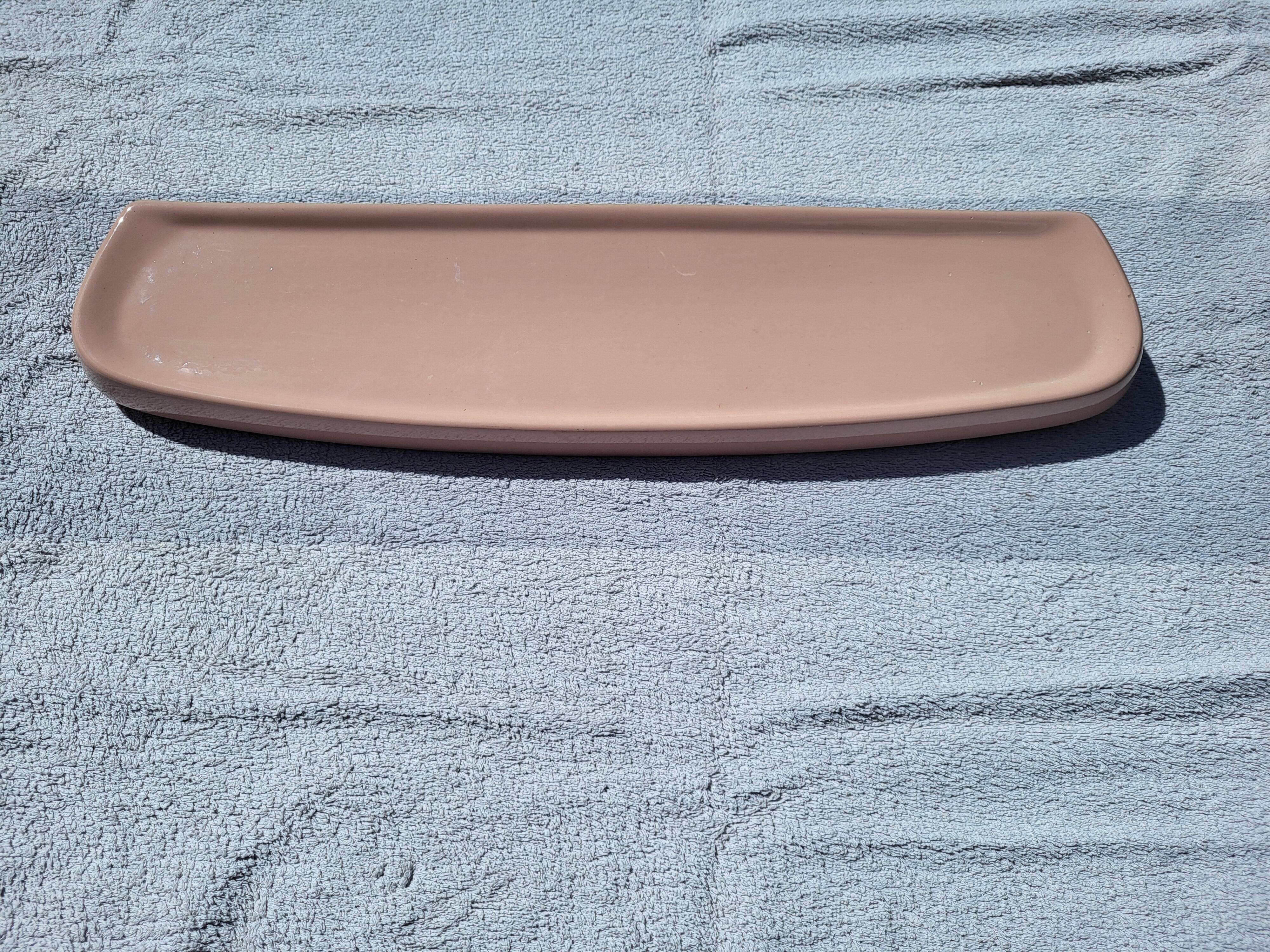 Vintage pink ceramic bathroom shelf