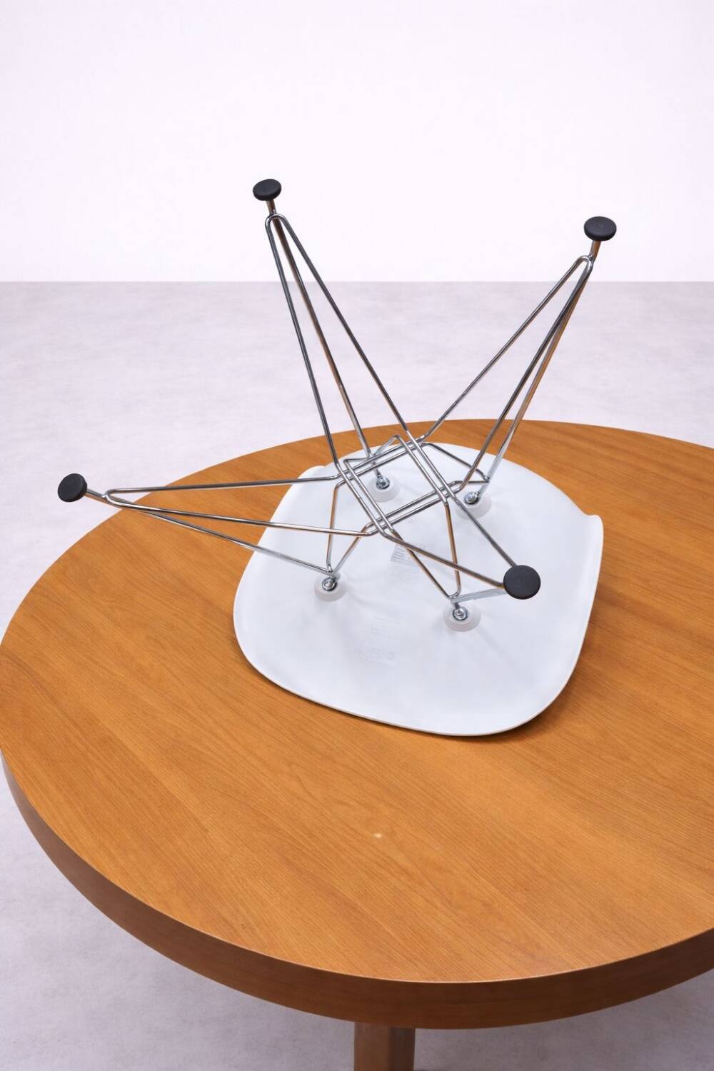 White DSR style Eames chair by Vitra with chrome Eiffel base.