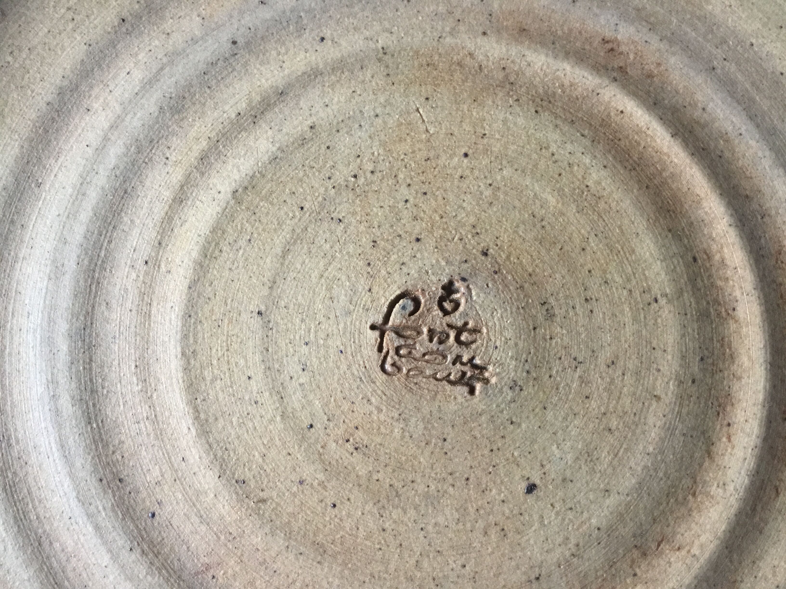 Emailed sandstone plate
